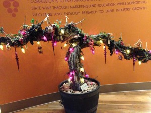 An old grapevine is lit up for Christmas at the Washington Wine Commission.