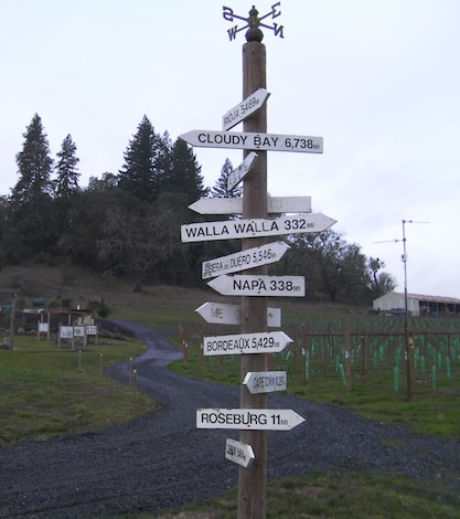 The signpost at Abacela in Roseburg, Ore., gives visitors an indication how far away from home they are. (Photo by Eric Degerman/Great Northwest Wine)