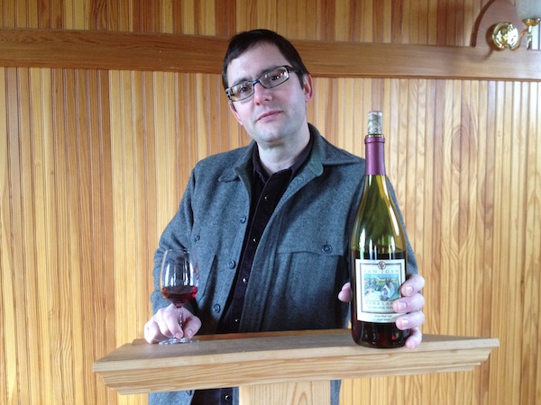 Chris Primus, winemaker for San Juan Vineyards, holds a bottle of the 2009 Estate Pinot Noir, the only time the wine was produced in the winery's 15-year history.