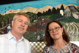 David O'Reilly, co-owner and winemaker for Owen Roe in Wapato, and Kay Simon of Chinook Wines serve as presenters for Wine Yakima Valley growers' luncheon on Monday, July 28, 2014 at Anthony's at Columbia Point in Richland, Wash.