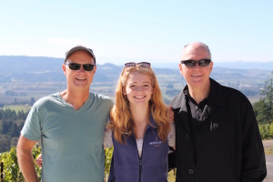 Cameron Healy, left, founder of Kettle Brand and Kona Brewing Co., has purchased full control of Scott Paul Wines from Scott Wright, right. Pirrie Wright, Scott's daughter, is flanked by the two longtime business partners.