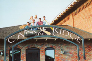 Founding winemaker John Abbott (wearing a red shirt) and friends pose for a candid photo atop Canoe Ridge Vineyard tasting room in Walla Walla, Wash. Abbott made the wine from 1993 until 2002, when he launched Abeja in the Walla Walla Valley.
