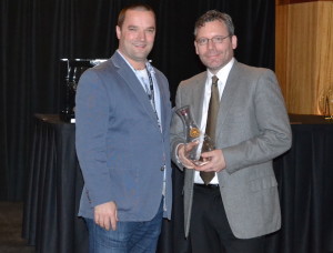 Chris Horn of Heavy Restaurant Group receives the Sommelier of the Year from Chris Stone and the Washington State Wine Commission on Jan. 27, 2015, in Seattle.
