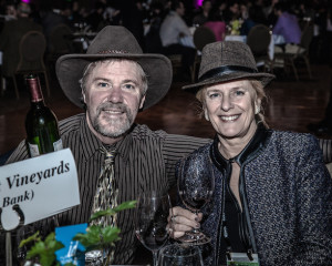 Yakima Valley winemaker Gordie Hill and Walla Walla vintner/grower Lynne Chamberlain raise a toast during the Washington Association of Wine Grape Growers' Unity Banquet in Kennewick, Wash.