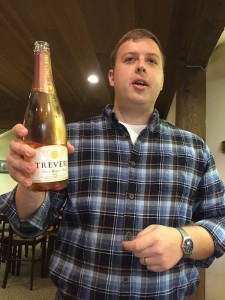 Christian Grieb of Treveri Cellars in Wapato, Wash., shares of bottle of his family's new release of sparkling Pinot Meunier.