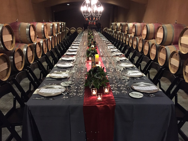 The table is set in the barrel chai at Col Solare on Red Mountain in preparation for the Luna Piena dinner with winemaker Darel Allwine and Cedarbrook Lodge chefs Roy Breiman and Mark Bodinet on Saturday, Aug. 29, 2015.
