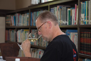 Doug Frost, a Master of Wine and a Master Sommelier, judges the 2015 Oregon Wine Experience competition in Jacksonville. (Photo by Colony One Studio/Courtesy of Oregon Wine Experience)