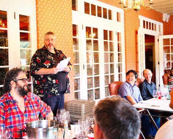 Andy Perdue, co-chair of the Great Northwest Invitational Wine Competition, provides instructions to the judges assembled Oct. 8, 2015, at the historic Columbia Gorge Hotel in Hood River, Ore.