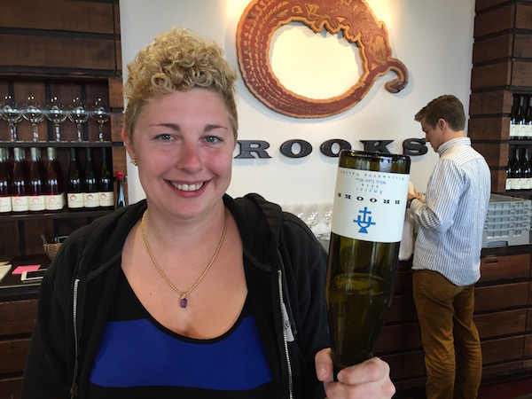 Jessica Pierce, director of wine education and communications at Brooks Winery in Amity, Ore., shows the versatility of the logo for the Brooks 2014 Amycus, a white blend created in the Edelzwicker style of Alsace.