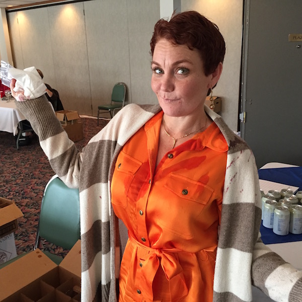Kristine Bono, tasting room manager for Goose Ridge Vineyards in Richland, Wash., suffers a red wine mishap while judging the 16th annual Platinum Competition for Wine Press Northwest magazine. The three-day judging of gold-medal winning wines made in the Pacific Northwest, wrapped up Oct. 30, 2015, at the Clover Island Inn in Kennewick, Wash.