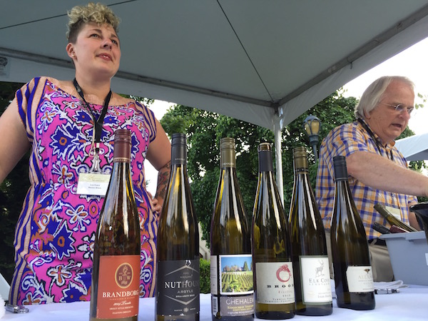 Jess Pierce of Brooks Wines, left, and Harry Peterson-Nedry, founding winemaker for Chehalem Wines, pour examples of Oregon Riesling at the grand tasting of Riesling Rendezvous on Sunday, July 17, 2016 in Woodinville, Wash. (Photo by Eric Degerman/Great Northwest Wine)